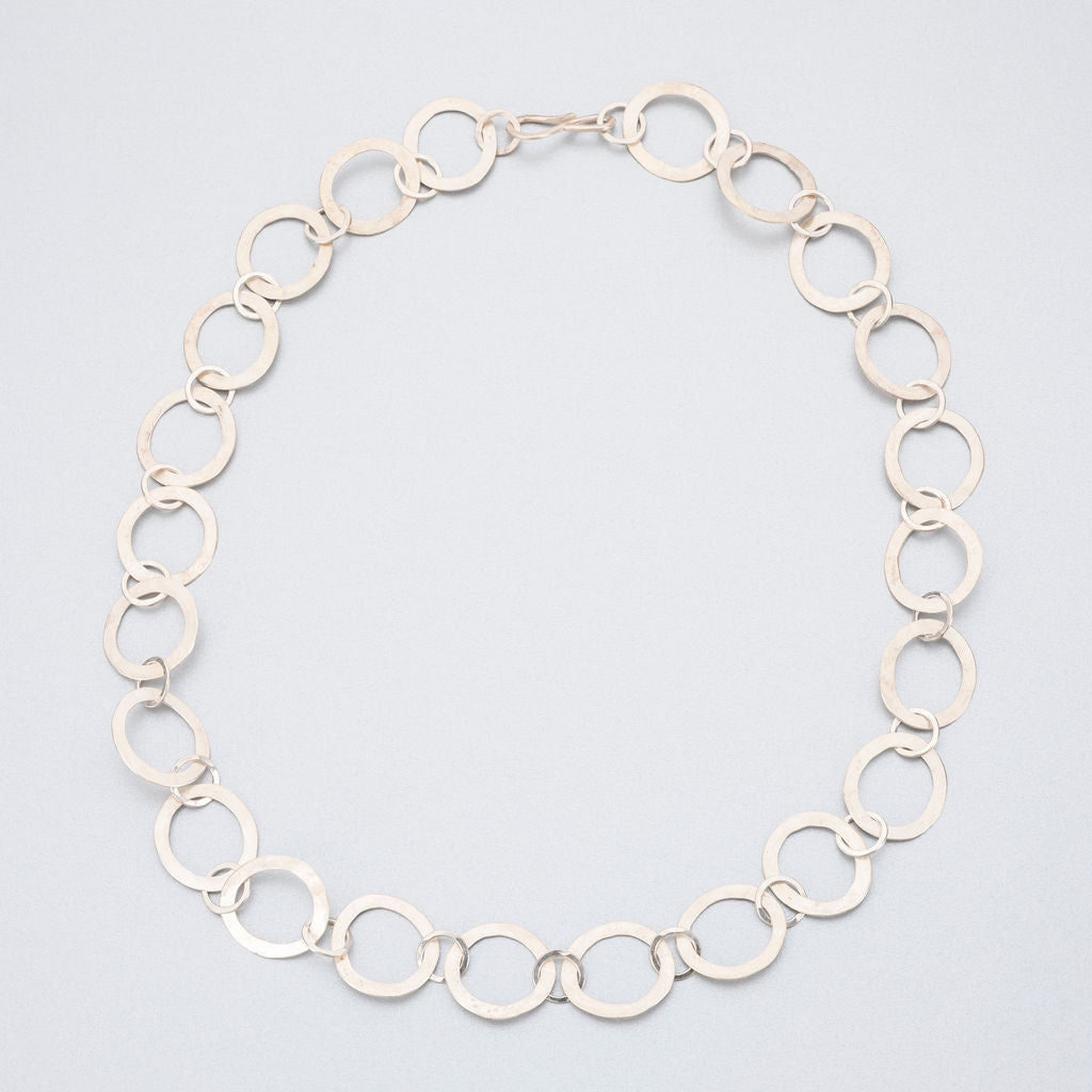 Hand beaten silver chain with flattened round links