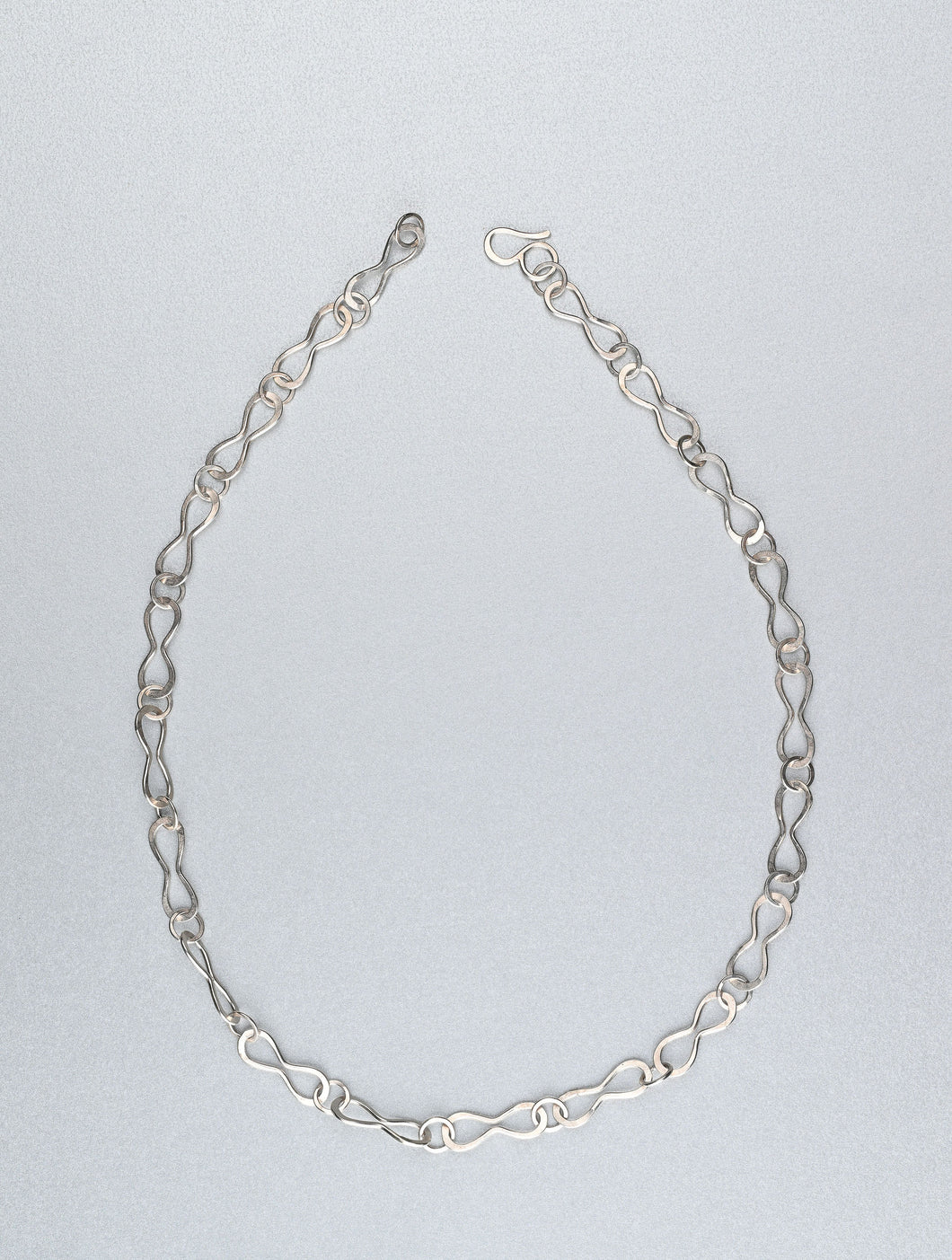 Hand beaten silver chain with figure of eight links