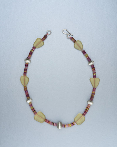 Beaded necklace with hand forged silver beads