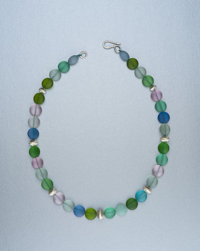 Beaded necklace with hand forged silver beads