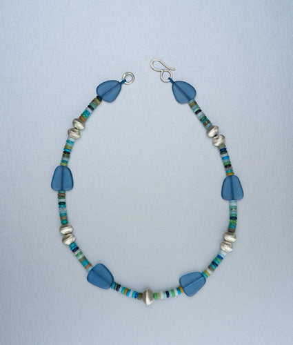 Beaded necklace with sea glass and silver