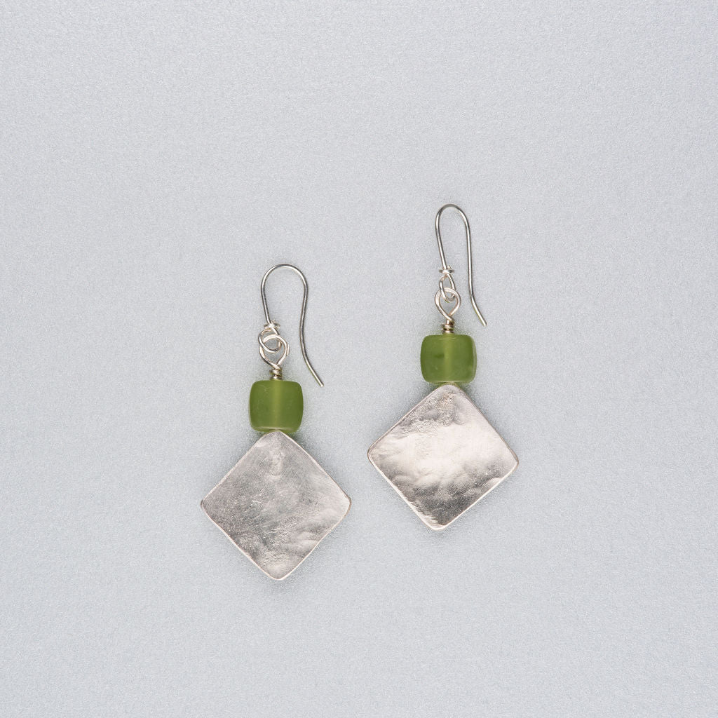 Silver earrings with green sea glass