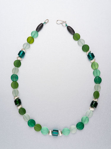 Beaded necklace with sea glass and silver