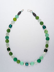 Beaded necklace with sea glass and silver