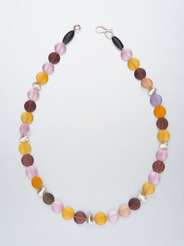 Beaded necklace with hand forged silver beads