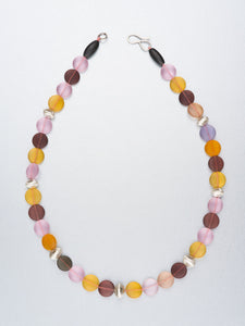 Beaded necklace with hand forged silver beads