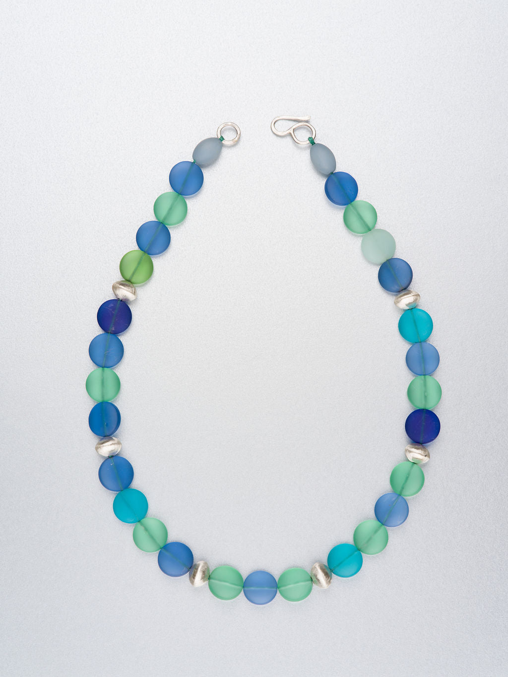 Beaded necklace with sea glass and silver