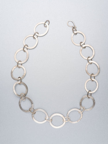 Hand beaten silver chain with round links