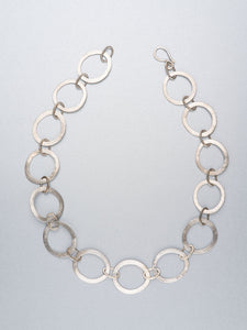 Hand beaten silver chain with round links