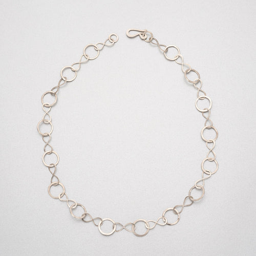 Hand beaten silver chain with figure of eight and round links