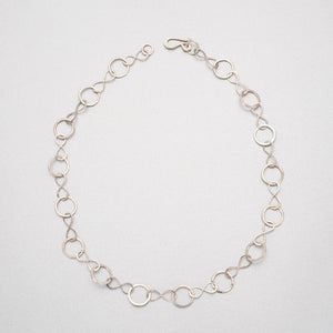 Hand beaten silver chain with figure of eight and round links